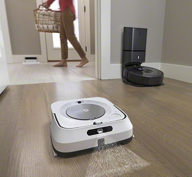 iRobot Roomba i7+ and a robot mop are working together